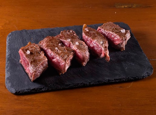urante exquisita carne a la brasa